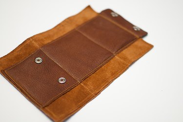 Sew outside and inside wallet together.