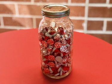 Mason jar filled with peppermint Hershey's Kisses