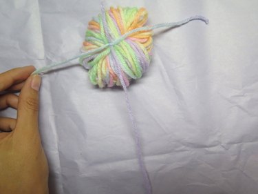Adding a tail to a bundle of yarn
