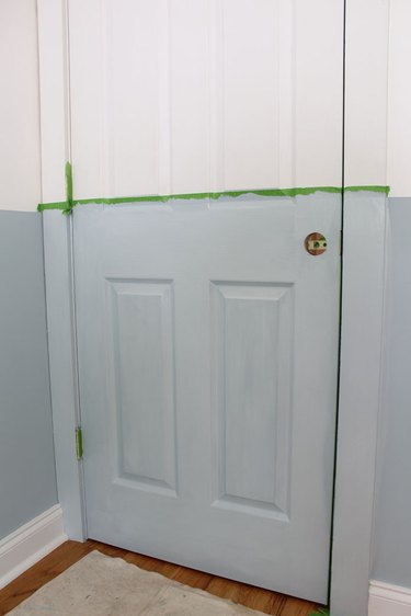 Paint the remaining areas of the interior door.