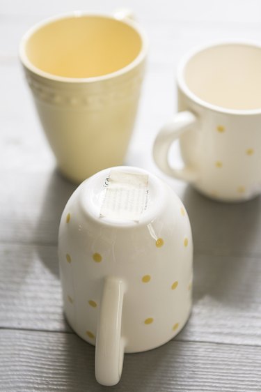 Tape on the bottom of a mug.