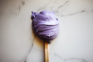 You can increase and deepen the shade of lavender by adding in a few drops of yellow food coloring.