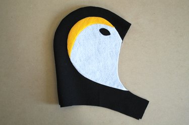 Turn the hood right side out and iron the seam flat.