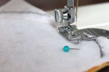 Stitch 1/4 inch inside curve.