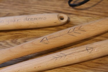 Sketch the design on the wood server