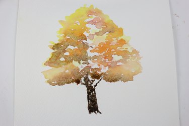 Painting the trunk of the tree
