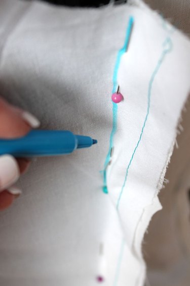 Mark along pin lines with a marker.