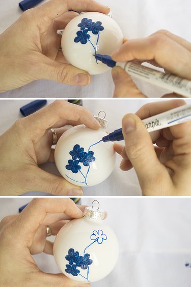 Drawing stems on flower heads.