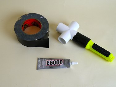 Attached flashlight and cross joint with epoxy and tape.