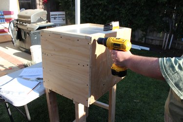 Installing the back wall.