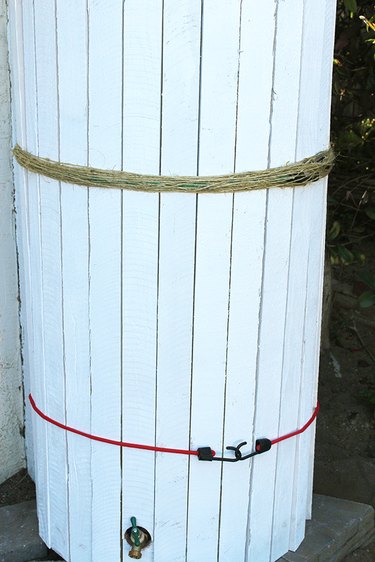 wrapping twine around the bungee cords
