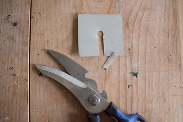Cut slit in aluminum lid