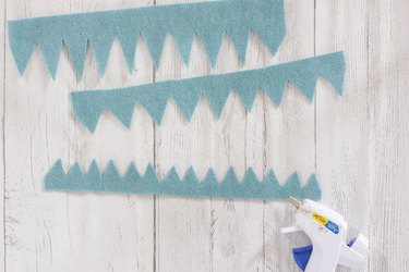 Gluing spiky strips of felt for DIY felt succulent plant