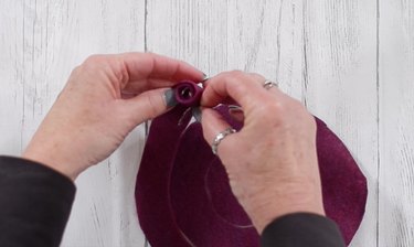 Rolling purple felt for DIY felt succulent plant