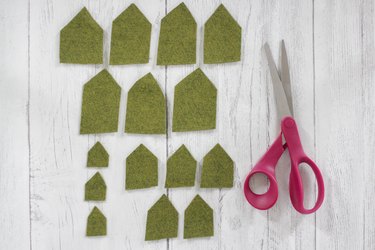 Green felt pieces cut into different sizes