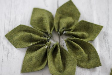 Forming a star shape with green felt