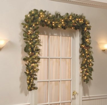 Pre-lit garland on door