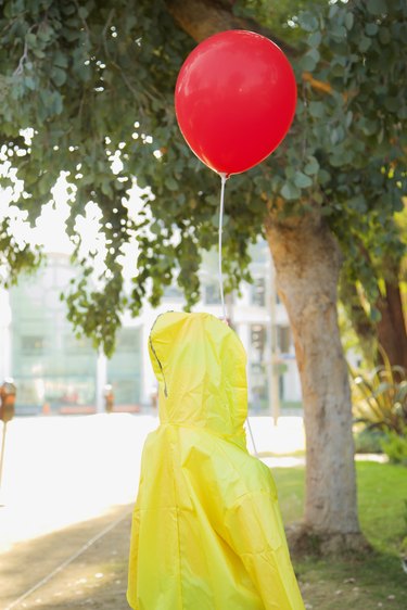 balloon taped to figure