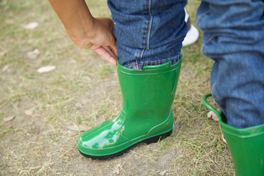 tucking the jeans into the boots
