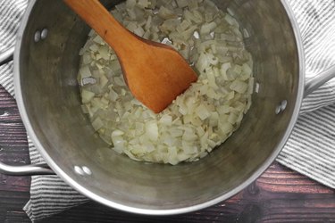 Cooking onions and garlic for creamy tortellini soup