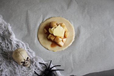 Apple pie filling on top of dough