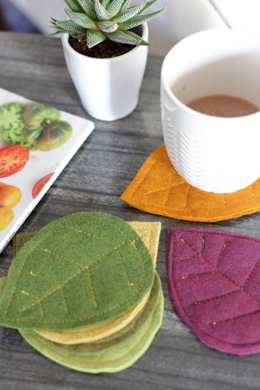diy felt fall leaves coaster in use with mug