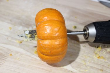 Drilling into a mini pumpkin bottom