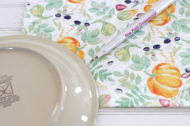 This holiday season, keep your rolls fresh and, at the same time, add some serious style to your table with a DIY fabric roll cover.
