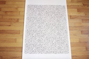 Gluing leopard poster board to foam board