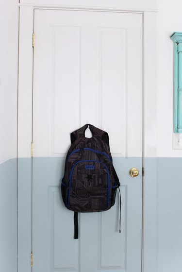 A hook on the back of the door adds storage space.