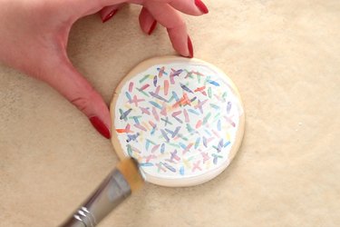 Apply decoupage to clay coaster
