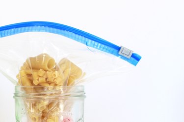 pasta + reclosable bag + hand sanitizer + dye