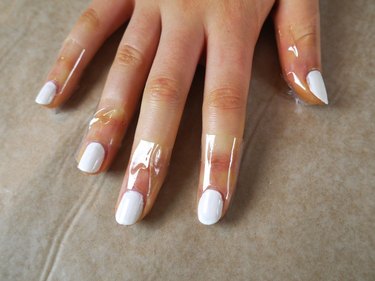 Area around the nails covered in tape