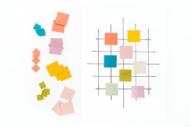 Lay out your paint chips on the gridded card stock until you're satisfied with the design.