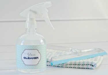 Spray bottle filed with glass cleaner