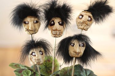 Transform an ordinary apple into a terrifying shrunken head.