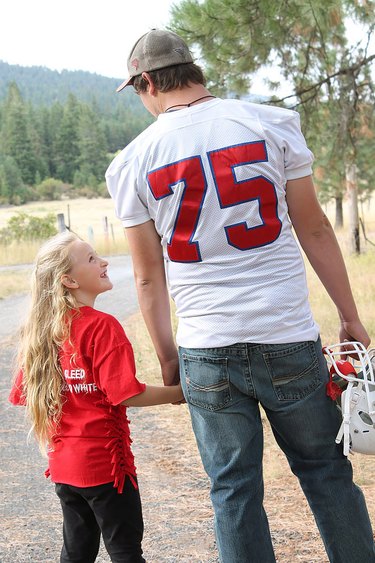 little girl wearing side-knotted t-shirt