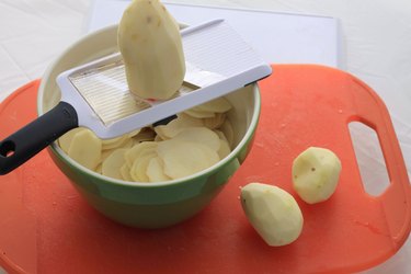 slicing potatoes