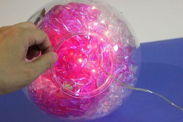 more colored cellophane added to globe