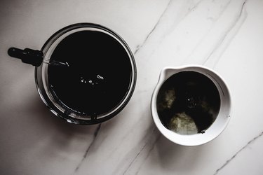 Add a few drops of the food color into a small bowl of water to test the strength of the color.