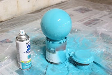 Blue spray paint on light fixture