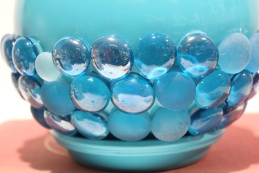 Glass beads on garden globe