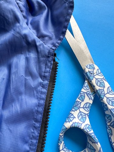 remove defective top stop with scissors