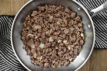 Ground beef cooking in a pan for Cheeseburger Casserole Recipe