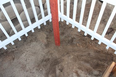 Post is secure in ground with dirt