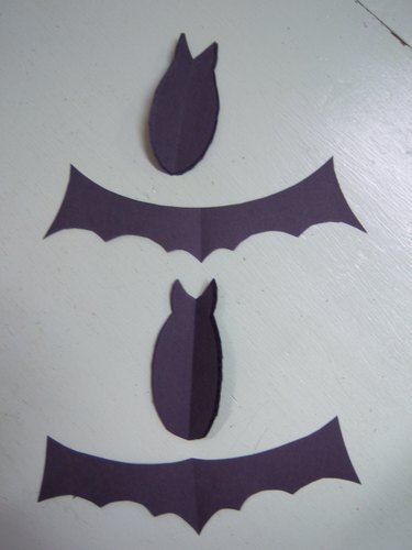 Line the wings up with the bat bodies.