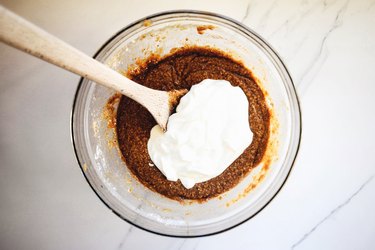 Mix in the yoghurt then add in your additions to form a smooth batter.
