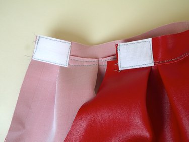Velcro squares on the waistline.