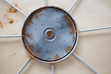 Painted lid with the look of rust