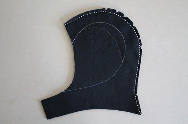 Sew the hood together and clip notches along the curve.